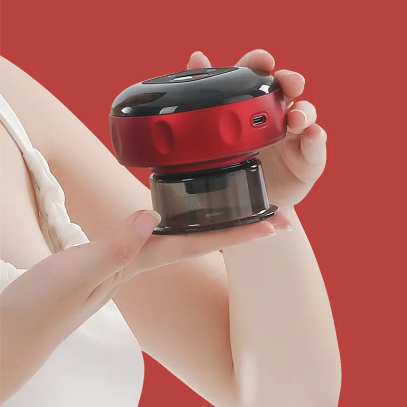 Red cupping massager held in hand